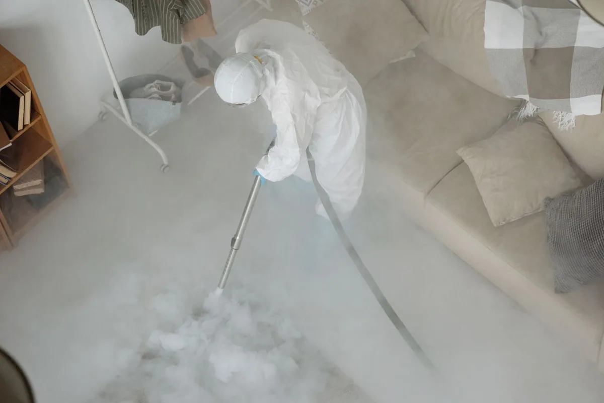Biohazard cleanup technician in protective equipment, Rocky Ridge, UT